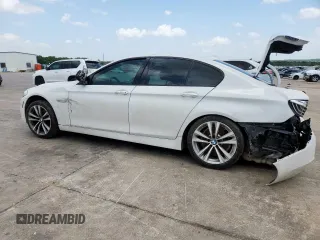 2016 BMW 5 Series 528i with VIN WBA5A5C59GD528109, listed as a Copart auction lot 61691405 with 107,837 mi miles and Salvage title. Bid and sale history available at DreamBid. Image 2.