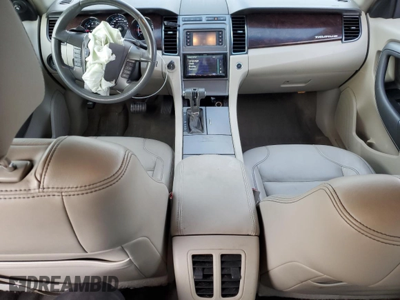 2012 Ford Taurus SEL with VIN 1FAHP2EW0CG133348, listed as a Copart auction lot 83031894 with 231,825 mi miles and Salvage Title. Bid and sale history available at DreamBid. Image 8.