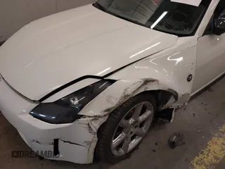 2005 Nissan 350Z Touring with VIN JN1AZ36A45M754923, listed as a IAAI auction lot 41720671 with 124,916 mi miles. Bid and sale history available at carsss.com. Image 6.
