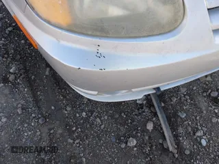 2005 Hyundai Accent GLS z VIN KMHCG45C25U623618, wystawiony jako IAAI lot #42140996 z przebiegiem 184 852 mil mil oraz . Historia ofert i sprzedaży dostępna na DreamBid. Obrazek 13.