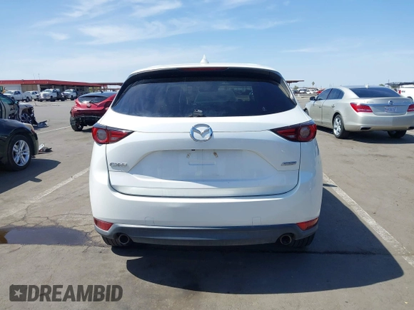 2018 Mazda CX-5 Grand Touring с VIN JM3KFADM7J0373815, выставлен на аукционе IAAI как лот 42500311 с пробегом 106 354 миль миль и . История ставок и продаж доступна на DreamBid. Изображение 16.