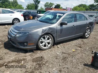 2012 Ford Fusion SE with VIN 3FAHP0HA0CR430214, listed as a Copart auction lot 61918795 with 107,823 mi miles and Salvage title. Bid and sale history available at DreamBid. Image 1.