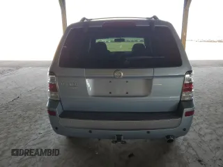 2009 Mercury Mariner Premier z VIN 4M2CU87G39KJ09339, wystawiony jako Copart lot #87247774 z przebiegiem 87 282 mil mil oraz Szkoda całkowita • Salvage title. Historia ofert i sprzedaży dostępna na DreamBid. Obrazek 6.