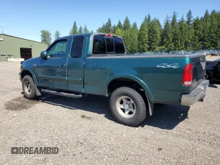 2000 Ford F-150 XL with VIN 1FTRX18L3YNA45245, listed as a Copart auction lot 64339045 with 116,631 mi miles and Clean title. Bid and sale history available at DreamBid. Image 2.