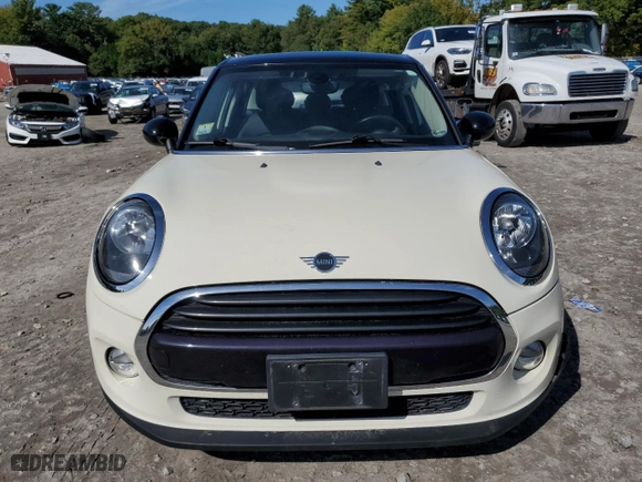 2019 MINI Hardtop 4 Door Cooper with VIN WMWXU1C56K2H74308, listed as a Copart auction lot 73110974 with 76,307 mi miles and Salvage Title. Bid and sale history available at carsss.com. Image 5.