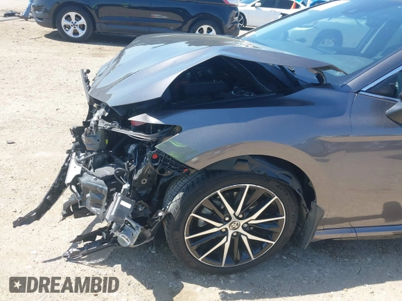 2023 Toyota Camry SE z VIN 4T1G11AK3PU735202, wystawiony jako IAAI lot #41874542 z przebiegiem 54 708 mil mil oraz . Historia ofert i sprzedaży dostępna na DreamBid. Obrazek 18.
