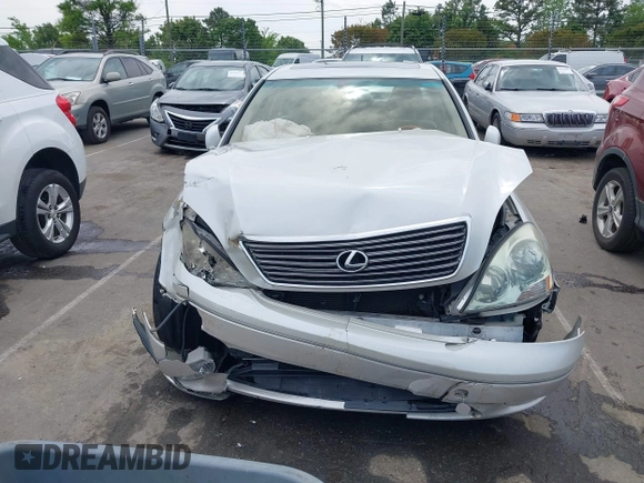 2001 Lexus LS 430 with VIN JTHBN30F110026221, listed as a IAAI auction lot 42022976 with 142,418 mi miles. Bid and sale history available at carsss.com. Image 12.