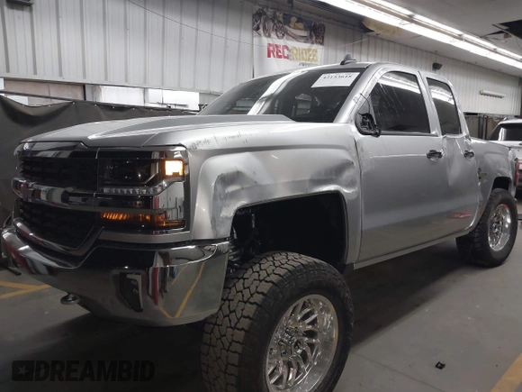 2018 Chevrolet Silverado 1500 LT with VIN 1GCVKREC1JZ151188, listed as a IAAI auction lot 42153618 with 82,391 mi miles and . Bid and sale history available at DreamBid. Image 2.