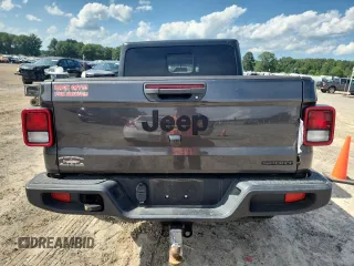 2021 Jeep Gladiator 80th Anniversary с VIN 1C6HJTAG7ML521094, выставлен на аукционе Copart как лот 61276595 с пробегом 68 684 миль миль и Списание • Salvage title. История ставок и продаж доступна на DreamBid. Изображение 6.