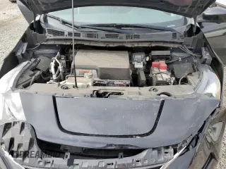 2022 Nissan LEAF SV Plus z VIN 1N4BZ1CV0NC558440, wystawiony jako Copart lot #55517325 z przebiegiem 121 310 mil mil oraz Szkoda całkowita • Salvage title. Historia ofert i sprzedaży dostępna na DreamBid. Obrazek 11.