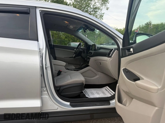 2019 Hyundai Tucson Value z VIN KM8J3CA48KU876515, wystawiony jako Copart lot #59052125 z przebiegiem 106 425 mil mil oraz Czysty tytuł • Clean title. Historia ofert i sprzedaży dostępna na DreamBid. Obrazek 5.