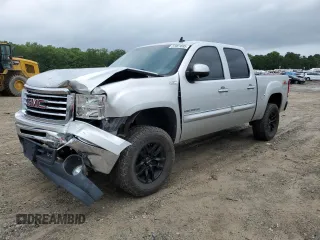 2010 GMC Sierra 1500 SLT with VIN 3GTRKWE32AG183700, listed as a Copart auction lot 57061695 with 111,581 mi miles and Salvage title. Bid and sale history available at DreamBid. Image 1.