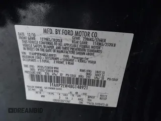 2011 Ford Taurus SEL with VIN 1FAHP2EW4BG148921, listed as a IAAI auction lot 41216094 with 248,814 mi miles. Bid and sale history available at carsss.com. Image 9.