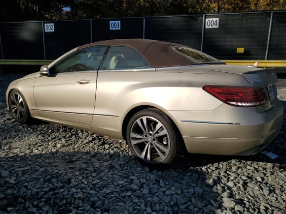 2016 Mercedes-Benz E 400 with VIN WDDKK6FF8GF334288, listed as a Copart auction lot 77405814 with 115,728 mi miles and Salvage Title. Bid and sale history available at carsss.com. Image 2.