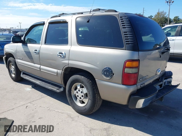 2001 Chevrolet Tahoe LS z VIN 1GNEC13T21J303213, wystawiony jako IAAI lot #41363563 z przebiegiem 194 243 mil mil oraz . Historia ofert i sprzedaży dostępna na DreamBid. Obrazek 3.
