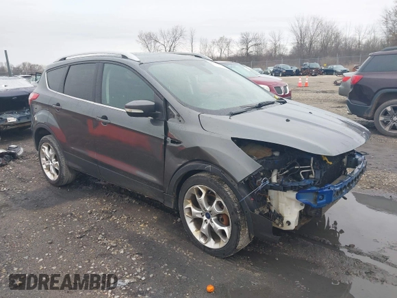 2015 Ford Escape Titanium with VIN 1FMCU9J94FUB49236, listed as a IAAI auction lot 42117378 with 112,267 mi miles. Bid and sale history available at carsss.com. Image 1.