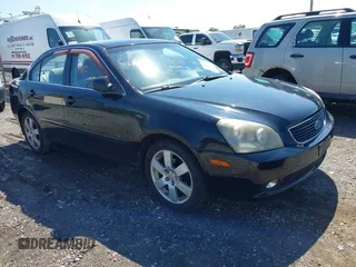 2007 Kia Optima LX z VIN KNAGE123975114599, wystawiony jako IAAI lot #42844412 z przebiegiem 165 074 mil mil oraz . Historia ofert i sprzedaży dostępna na DreamBid. Obrazek 1.
