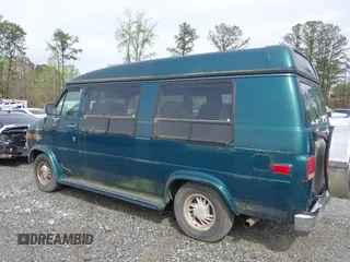 1995 Chevrolet Chevy Van z VIN 1GBEG25K0SF243254, wystawiony jako IAAI lot #41915622 z przebiegiem 74 262 mil mil oraz . Historia ofert i sprzedaży dostępna na DreamBid. Obrazek 14.