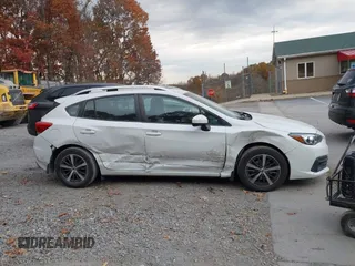 2020 Subaru Impreza Premium z VIN 4S3GTAV65L3706134, wystawiony jako IAAI lot #40711288 z przebiegiem 56 288 mil mil oraz . Historia ofert i sprzedaży dostępna na DreamBid. Obrazek 14.
