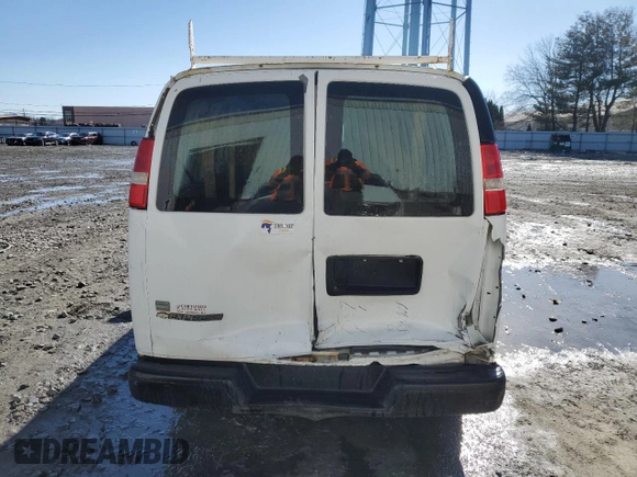 2012 Chevrolet Express Cargo with VIN 1GCSGAFX8C1107214, listed as a Copart auction lot 44963945 with 273,256 mi miles and Salvage title. Bid and sale history available at DreamBid. Image 6.