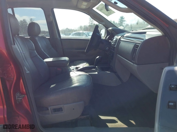 2003 Jeep Grand Cherokee Laredo with VIN 1J4GW48S33C556441, listed as a IAAI auction lot 42026804 with 189,143 mi miles. Bid and sale history available at carsss.com. Image 5.