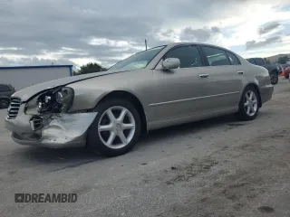 2002 Infiniti Q45 z VIN JNKBF01A92M000300, wystawiony jako Copart lot #70999144 z przebiegiem 193 872 mil mil oraz Nie do naprawy. Historia ofert i sprzedaży dostępna na DreamBid. Obrazek 1.