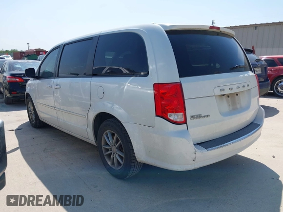 2015 Dodge Grand Caravan SE with VIN 2C4RDGBG9FR691462, listed as a IAAI auction lot 42197050 with 124,239 mi miles and . Bid and sale history available at DreamBid. Image 3.