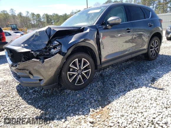 2018 Mazda CX-5 Grand Touring with VIN JM3KFADM2J1313418, listed as a Copart auction lot 49486875 with 94,930 mi miles and Salvage Title. Bid and sale history available at carsss.com. Image 1.