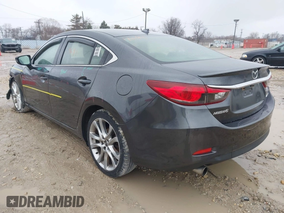 2015 Mazda 6 i Grand Touring with VIN JM1GJ1W56F1207077, listed as a IAAI auction lot 41734641 with 109,447 mi miles and . Bid and sale history available at DreamBid. Image 3.