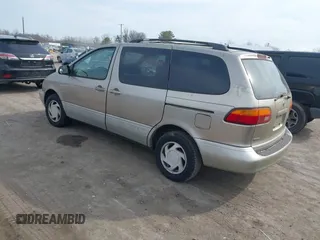 2000 Toyota Sienna LE z VIN 4T3ZF13C1YU211572, wystawiony jako IAAI lot #41724715 z przebiegiem 265 622 mil mil oraz . Historia ofert i sprzedaży dostępna na DreamBid. Obrazek 3.