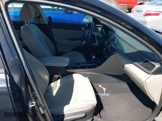 2016 Kia Optima LX with VIN 5XXGT4L3XGG013835, listed as a IAAI auction lot 41815349 with 120,628 mi miles. Bid and sale history available at carsss.com. Image 5.