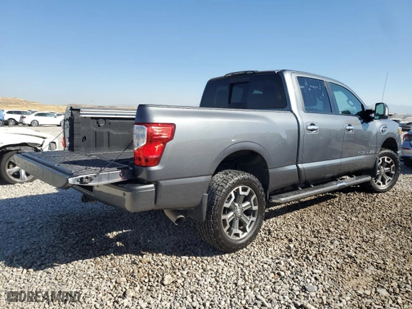 2016 Nissan Titan XD PRO-4X with VIN 1N6BA1F44GN517947, listed as a Copart auction lot 75524654 with 79,016 mi miles and Salvage Title. Bid and sale history available at carsss.com. Image 3.