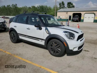 2012 MINI Countryman S with VIN WMWZC5C5XCWM14551, listed as a Copart auction lot 57329265 with 140,814 mi miles and Clean Title. Bid and sale history available at DreamBid. Image 4.