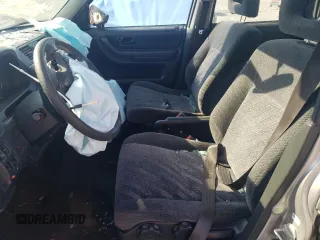 2001 Honda CR-V LX z VIN JHLRD28451S018453, wystawiony jako Copart lot #50223485 z przebiegiem 143 894 mil mil oraz Szkoda całkowita • Salvage title. Historia ofert i sprzedaży dostępna na DreamBid. Obrazek 7.