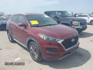 2019 Hyundai Tucson Sport z VIN KM8J33AL3KU039436, wystawiony jako IAAI lot #42021571 z przebiegiem 94 981 mil mil oraz . Historia ofert i sprzedaży dostępna na DreamBid. Obrazek 1.