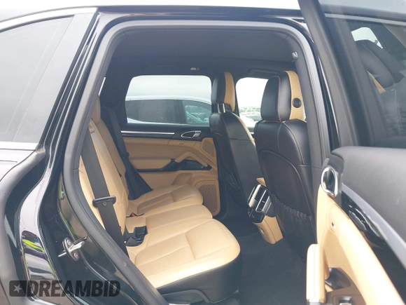 2014 Porsche Cayenne with VIN WP1AA2A21ELA92673, listed as a IAAI auction lot 41597732 with 140,673 mi miles and . Bid and sale history available at DreamBid. Image 8.