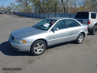 2000 Audi A4 with VIN WAUDH28DXYA145742, listed as a IAAI auction lot 42017244 with 235,373 mi miles. Bid and sale history available at carsss.com. Image 2.