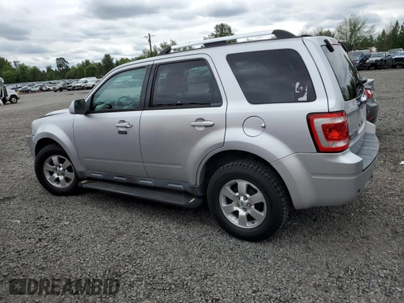 2010 Ford Escape Limited with VIN 1FMCU0EG9AKA54244, listed as a Copart auction lot 56930955 with 88,496 mi miles and Salvage title. Bid and sale history available at DreamBid. Image 2.