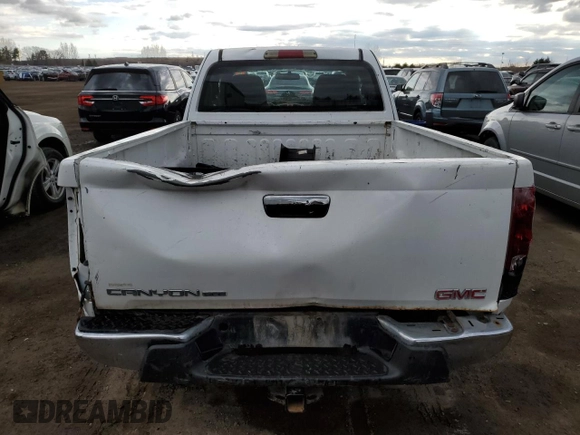 2012 GMC Canyon z VIN 1GTE5NFE9C8150251, wystawiony jako Copart lot #52897835 z przebiegiem 195 834 mil mil oraz Czysty tytuł • Clean title. Historia ofert i sprzedaży dostępna na DreamBid. Obrazek 6.