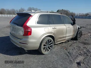 2016 Volvo XC90 T6 Momentum with VIN YV4A22PKXG1053114, listed as a IAAI auction lot 41772931 with Not Provided miles and . Bid and sale history available at carsss.com. Image 4.