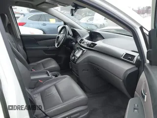 2014 Honda Odyssey Touring with VIN 5FNRL5H94EB001479, listed as a IAAI auction lot 41123678 with 147,269 mi miles and . Bid and sale history available at carsss.com. Image 5.