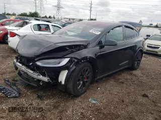 2024 Tesla Model X Plaid with VIN 7SAXCBE68RF437342, listed as a Copart auction lot 69244014 with Not Provided miles and Salvage Title. Bid and sale history available at DreamBid. Image 1.