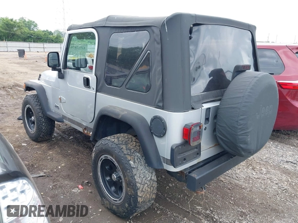2004 Jeep Wrangler Sport with VIN 1J4FA49S44P772575, listed as a IAAI auction lot 42512876 with 226,387 mi miles and . Bid and sale history available at DreamBid. Image 3.