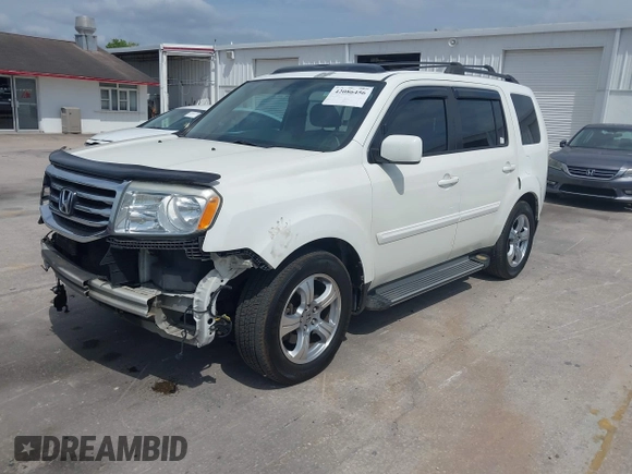 2014 Honda Pilot EX-L with VIN 5FNYF4H52EB055549, listed as a IAAI auction lot 42086456 with 292,594 mi miles and . Bid and sale history available at carsss.com. Image 18.