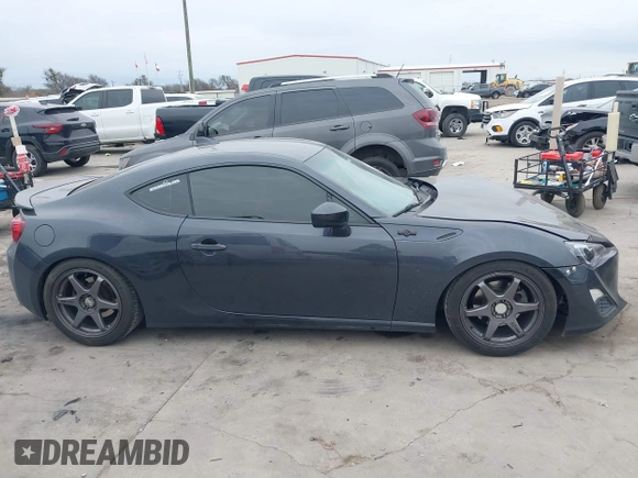 2016 Scion FR-S with VIN JF1ZNAA15G8708350, listed as a IAAI auction lot 41679656 with 111,245 mi miles. Bid and sale history available at carsss.com. Image 14.