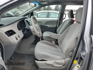 2012 Toyota Sienna with VIN 5TDKA3DC4CS014867, listed as a Copart auction lot 43191655 with 169,517 mi miles and Salvage Title. Bid and sale history available at DreamBid. Image 7.