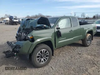 2021 Toyota Tacoma SR z VIN 3TYSZ5ANXMT019751, wystawiony jako Copart lot #47079095 z przebiegiem Nie podano mil oraz Szkoda całkowita • Salvage title. Historia ofert i sprzedaży dostępna na DreamBid. Obrazek 1.