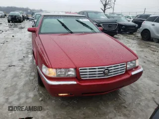 2001 Cadillac Eldorado ESC z VIN 1G6EL12Y61B107519, wystawiony jako Copart lot #38051744 z przebiegiem 52 018 mil mil oraz Czysty tytuł • Clean title. Historia ofert i sprzedaży dostępna na DreamBid. Obrazek 5.