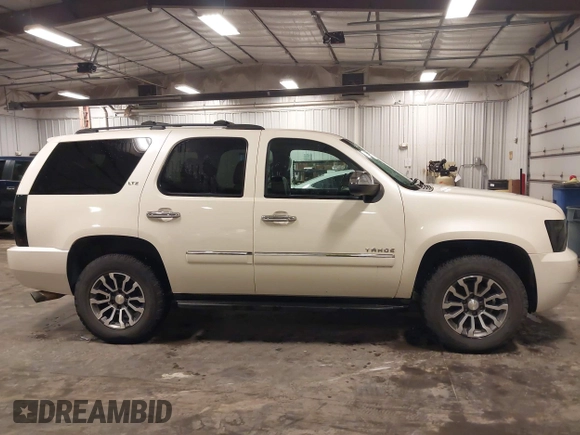 2012 Chevrolet Tahoe LTZ with VIN 1GNSKCE07CR227674, listed as a IAAI auction lot 42166732 with 204,171 mi miles and . Bid and sale history available at DreamBid. Image 13.