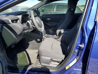 2024 Toyota Corolla Hatchback SE with VIN JTND4MBE3R3230872, listed as a Copart auction lot 76112324 with 6,882 mi miles and Salvage Title. Bid and sale history available at carsss.com. Image 7.